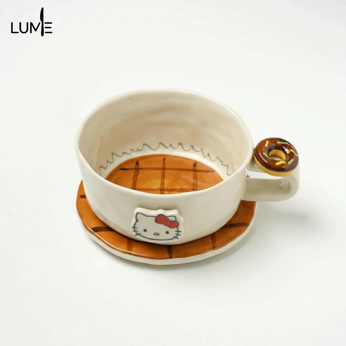 KT coffee cups and saucers