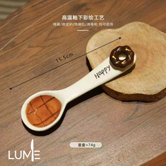 KT shaped spoon