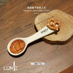 KT shaped spoon