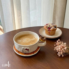 KT coffee cups and saucers