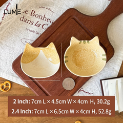 Kitten dipping saucer